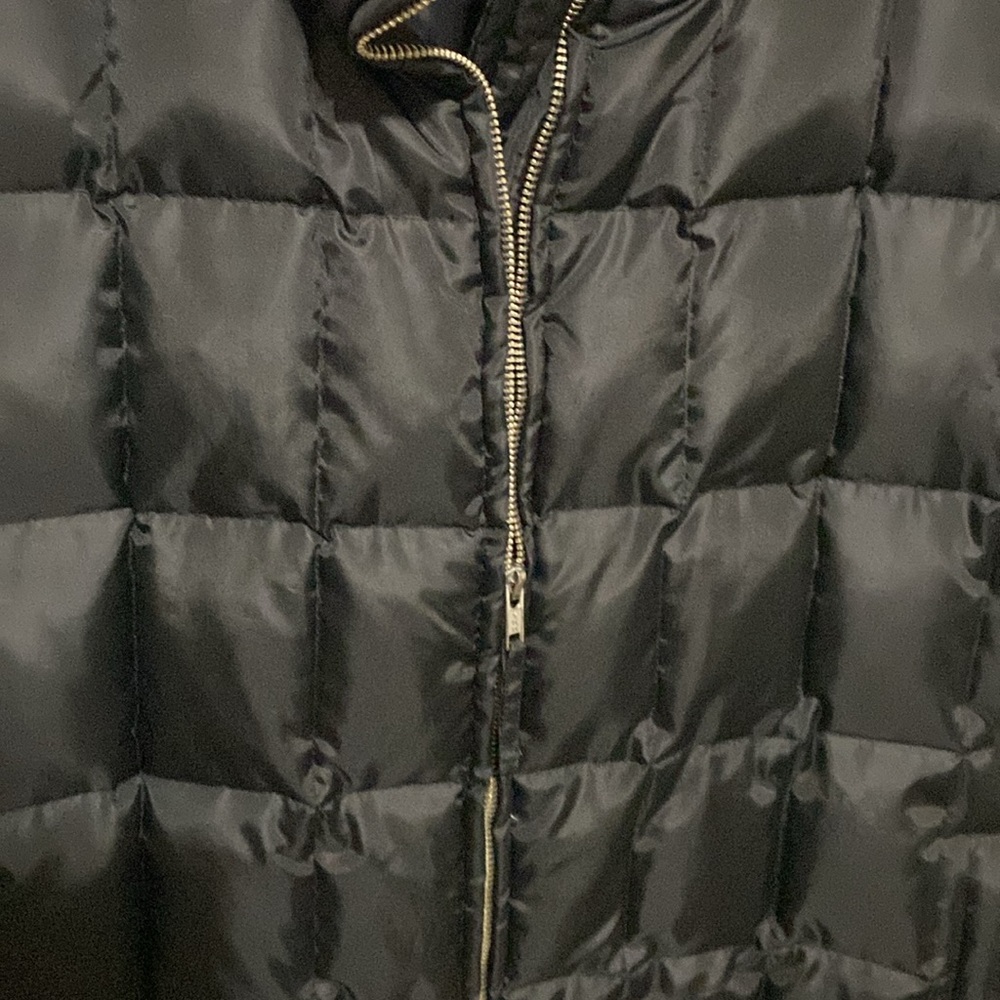 Glacier’s edge black puffy vest. This would be great for the winter months.